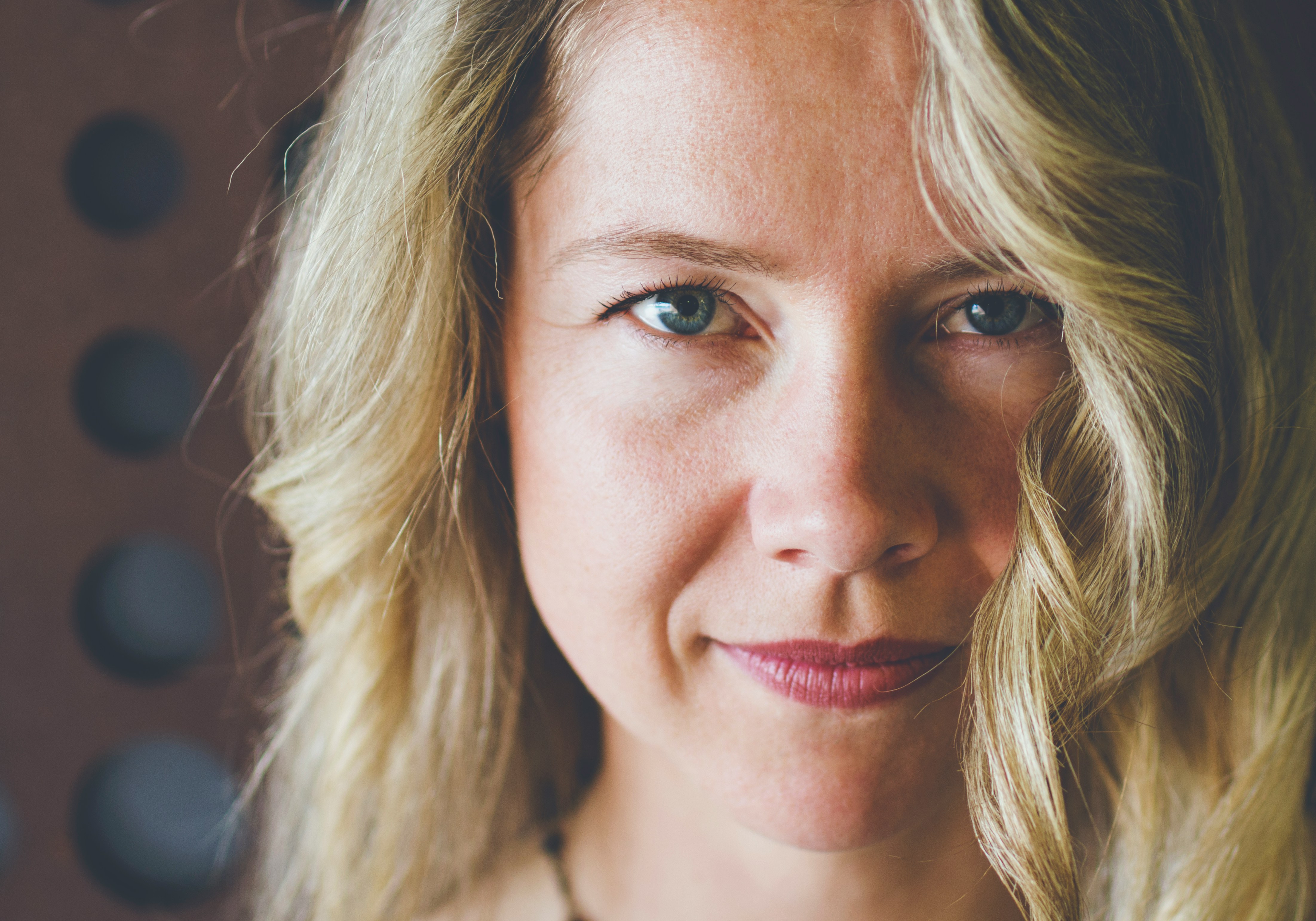 Woman with warm smile, natural portrait